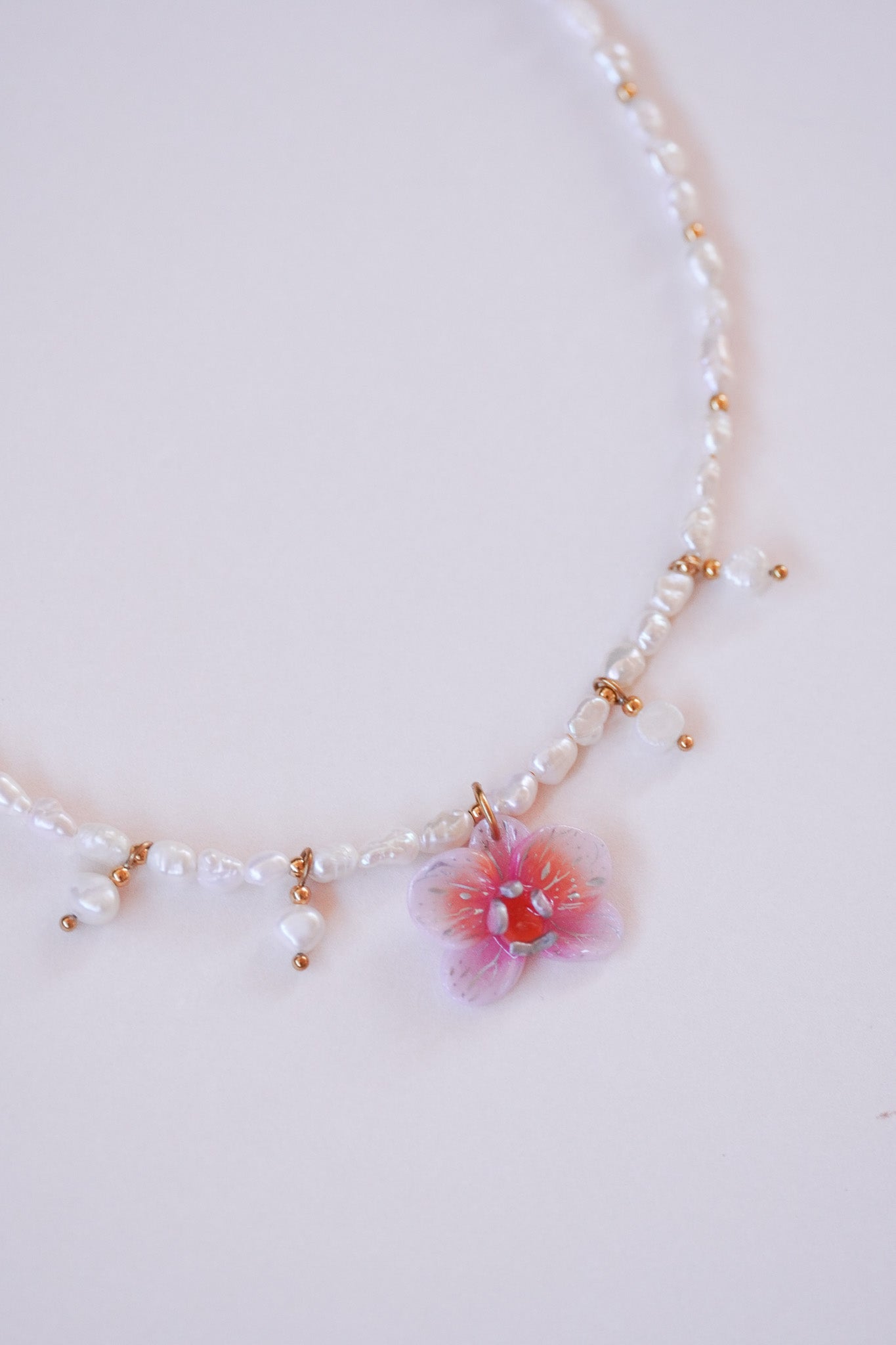 Collier orchidée Corail