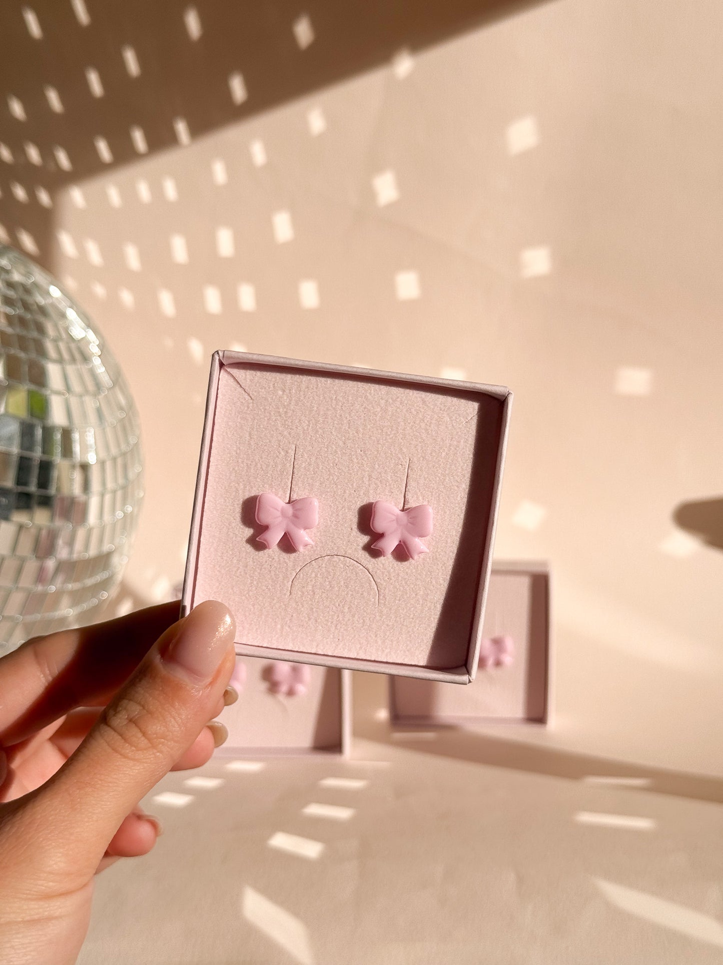 boucle d oreille noeud rose