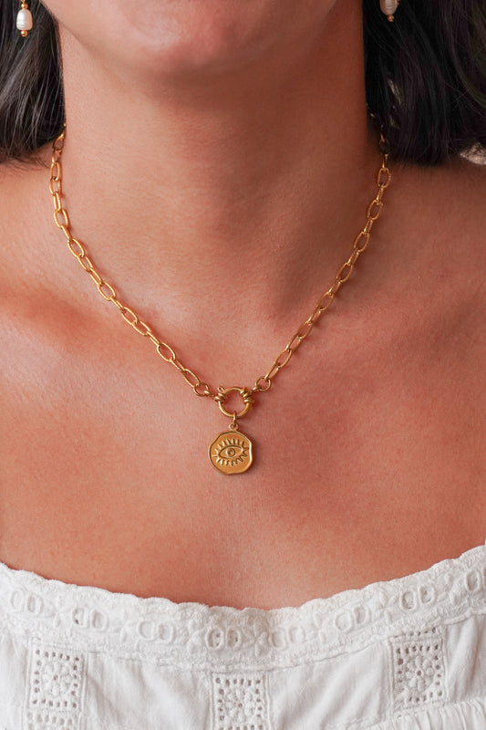 Collier médaillon œil