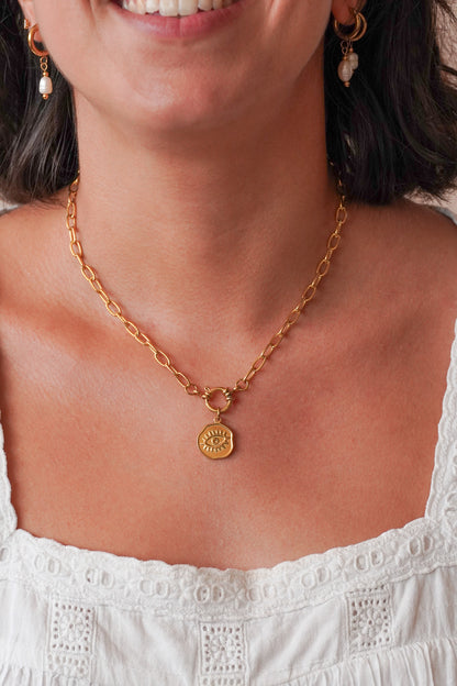 Collier médaillon œil